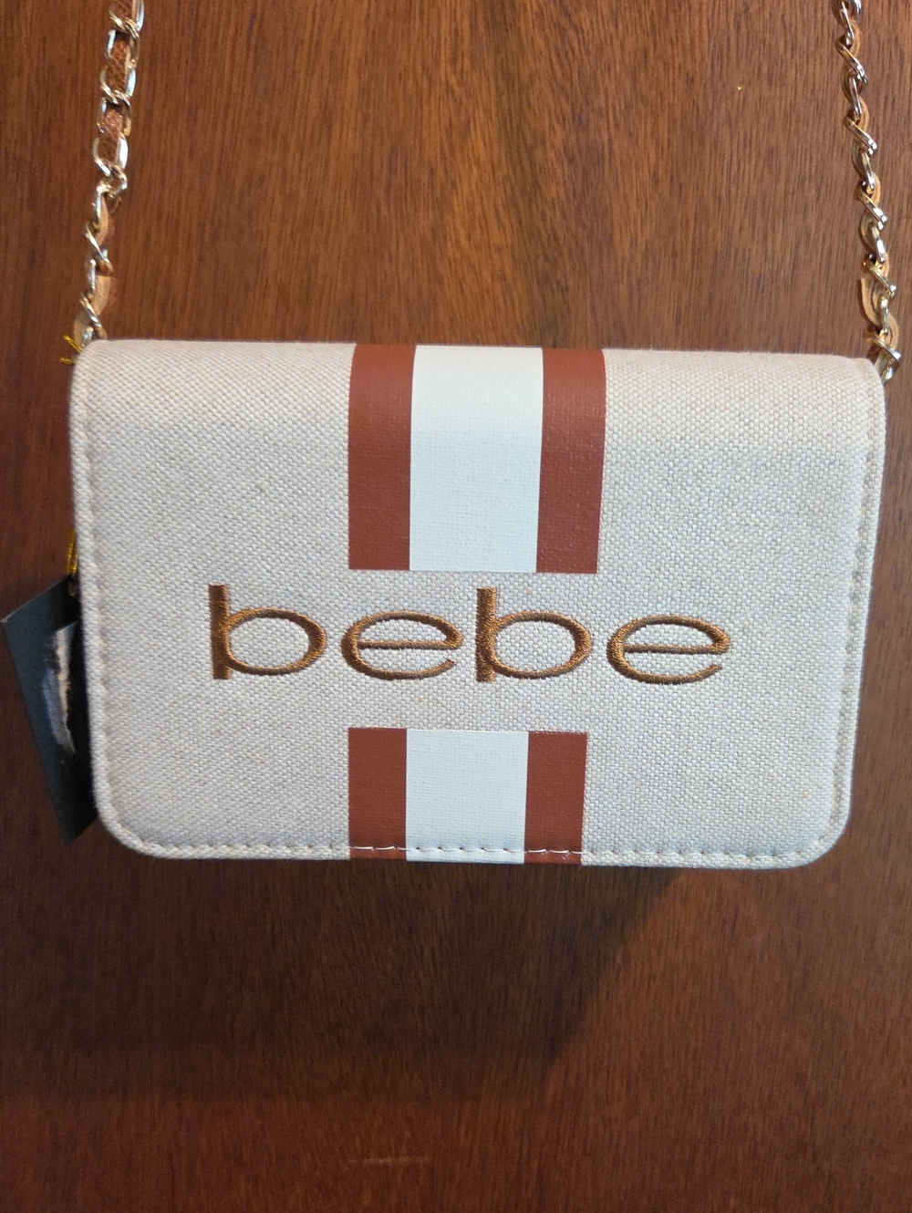 bebe -Beige Canvas Crossbody with Brown and Chain Woven With Leather Strap.